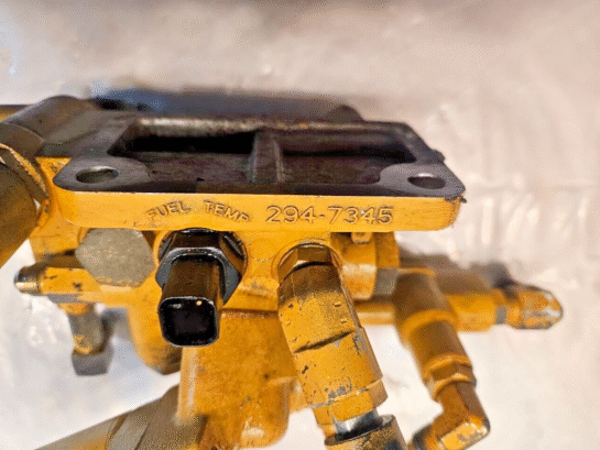 CAT C15 ACERT CATERPILLAR Engine Diesel Fuel Filter Head 294-7345 OEM - 420$ Picture 1 of 5 Picture 2 of 5 Picture 3 of 5 Picture 4 of 5