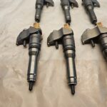 Set of 6 2017 Paccar MX13 Diesel Engine Fuel Injectors 2047600 OEM w/ Hold Downs - 1710$ Picture 1 of 7 Picture 2 of 7 Picture 3 of 7 Picture 4 of 7 Picture 5 of 7 Picture 6 of 7 Picture 7 of 7 Picture 1 of 7 Picture 2 of 7 Picture 3 of 7