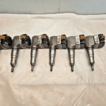 Set of 6 CAT 3126 Diesel Engine Side Mount Fuel Injector 0R4970 OEM 116-7150 -  Picture 1 of 9 Picture 2 of 9 Picture 3 of 9 Picture 4 of 9 Picture 5 of 9 Picture 6 of 9 Picture 7 of 9 Picture 8 of 9 Picture 9 of 9 Picture 1 of 9